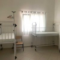 Two cots in a hospital room